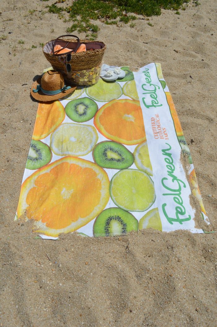 Toalha de praia laranja e Kiwi