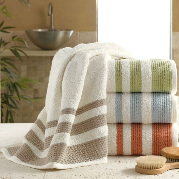 100% cotton terry bath towels with 3 decorative borders. Velour touch and finish.